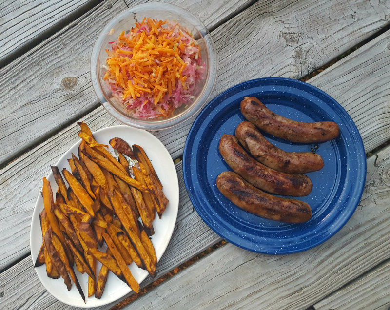 Grilled sausages, sweet potato fries and root veggie salad.