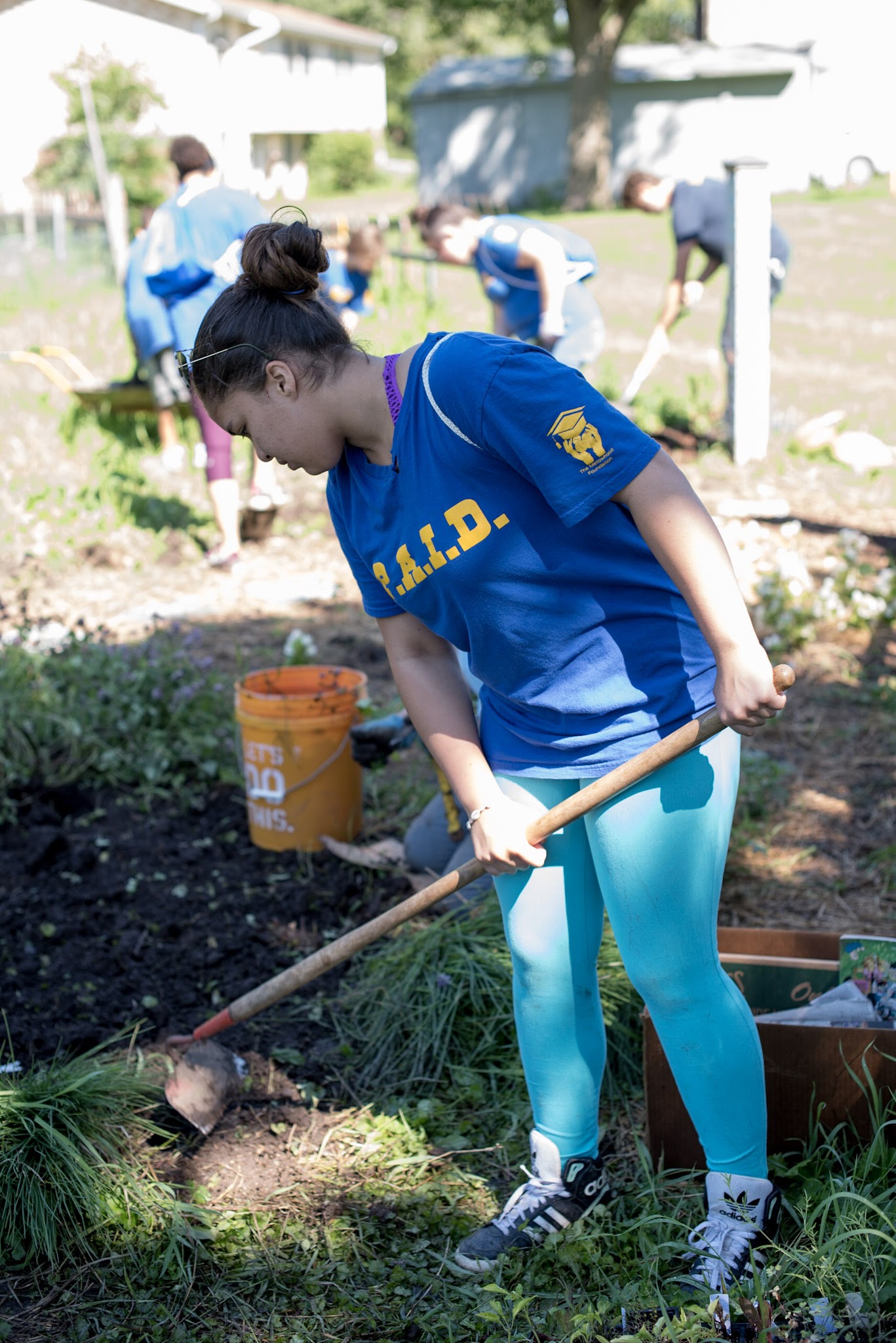 Weeding and hoeing is never done at the Mellowhood garden. Photo by Nick Bernard Photography.