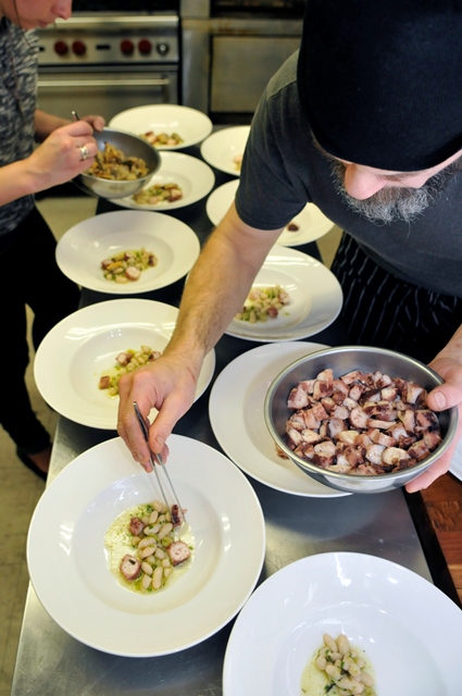 Anthony Swartwout from The Mint plates a dish.