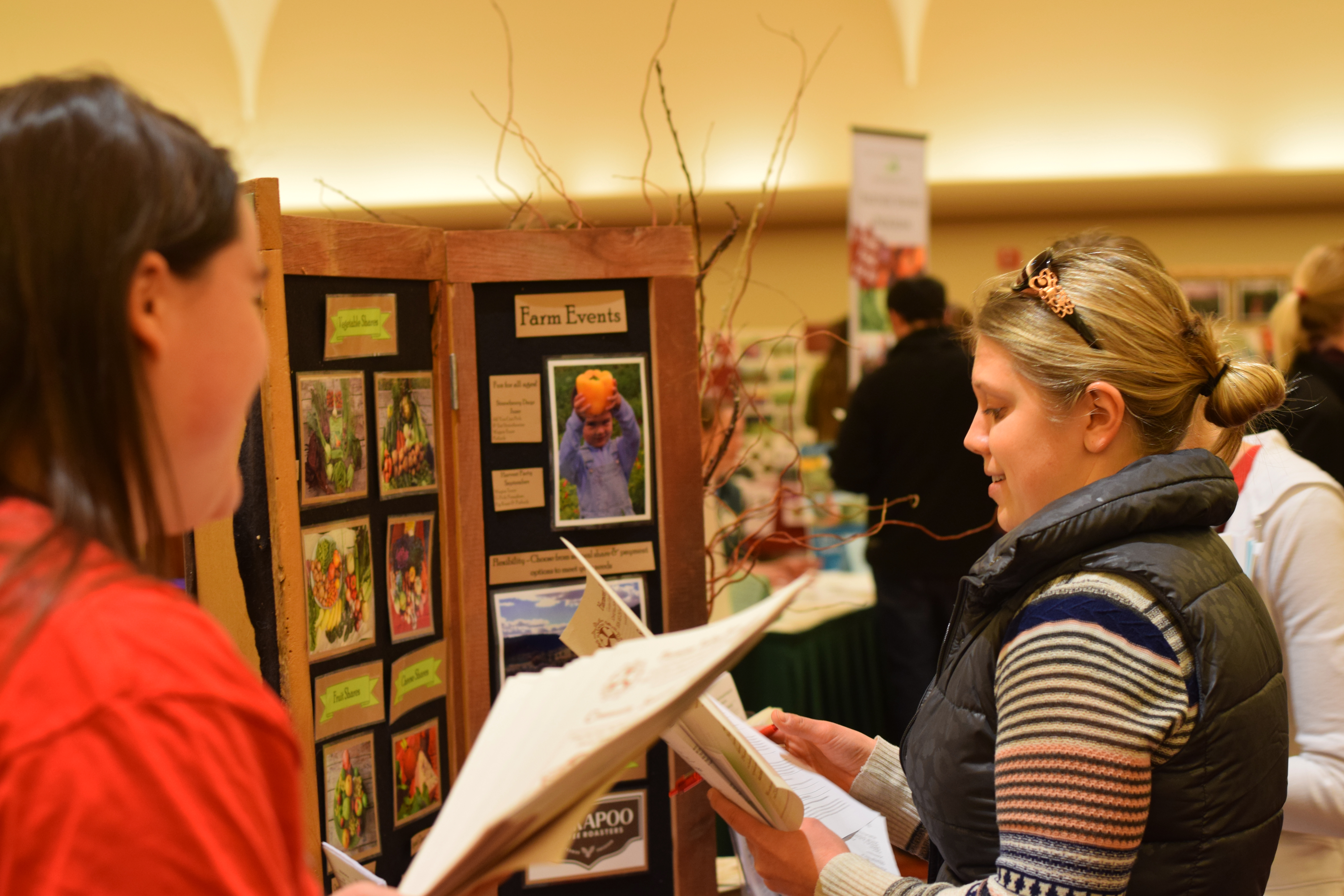 Harmony Valley Farm booth at FairShare's annual CSA Open House.