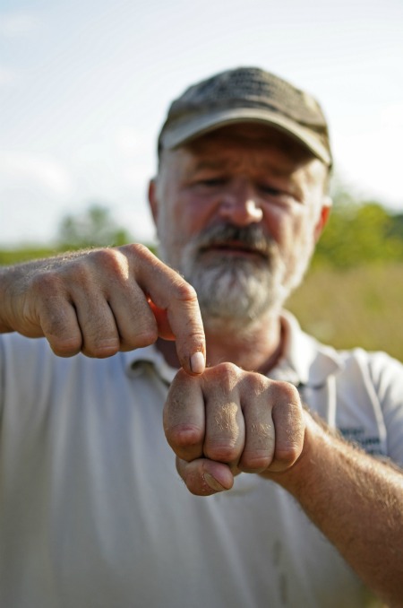 Mark explains the drainage of his water management system.