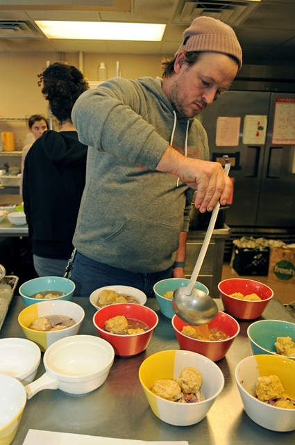 Guest chef Jonny Hunter of Underground Food Collective works with Slow Food UW to create a Family Dinner Night meal.