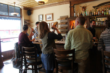Participants learning how to shake a drink.