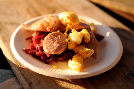 BRASSERIE V - Belgian beer sausage with duck fat over braised cabbage topped with seasoned egg