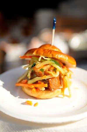 MID TOWN PUB – Boneless chicken wing, Hidden Springs bleu cheese and carrot vidalia slaw on a pretzel bun